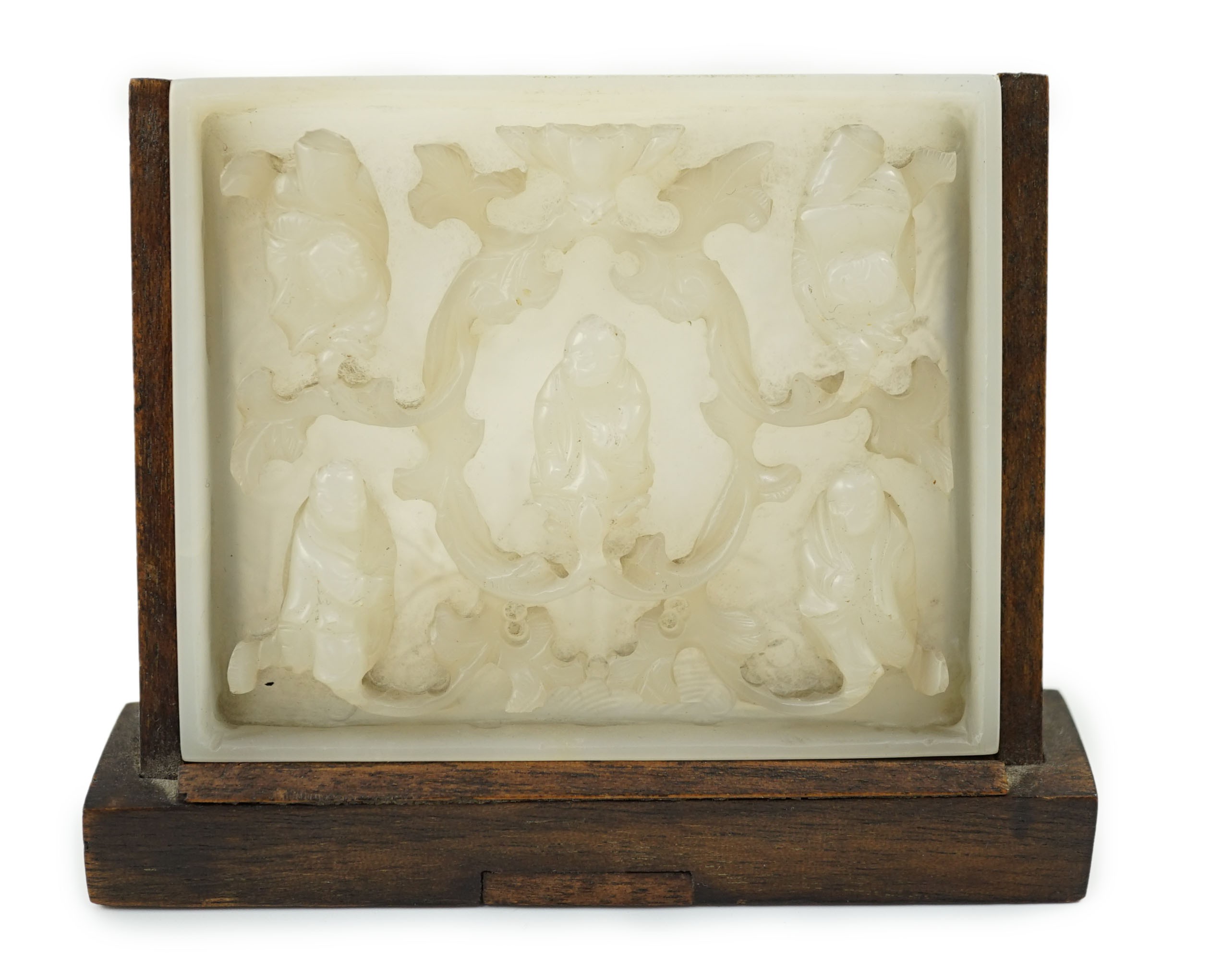 An unusual Chinese white jade plaque, 18th/19th century, 6.7cm x 8.1cm, wood stand